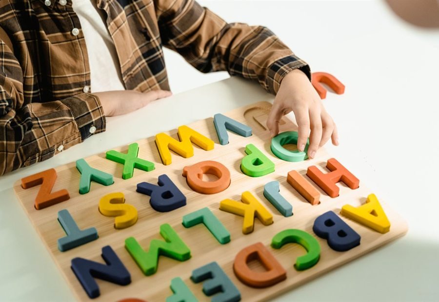 Wooden alphabet letters used for phonics
