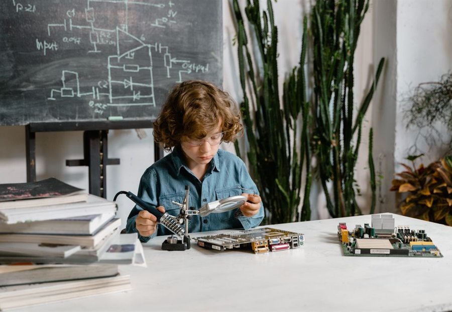 A child carrying out a simple science experiment